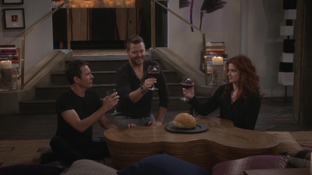 Jackson shares a toast with Will and Grace